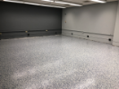 August 5, 2019. Millennium Construction has installed the epoxy flooring! After looking at another UB epoxy floor, Millennium PM Mike decided to tweak the percentages to 70% white, 15% blue, and 15% gray.