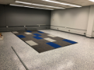 August 26, 2019. GP Flooring has finished installing the carpet. The carpet run looks too short, so we're going to add two more rows of carpet tiles.