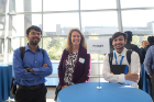 Cynthia Hoover, Executive Director of Adsorption & HYCO R&D for Praxair, (center) poses for a photo with two graduate students at the networking reception.