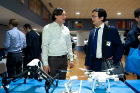 Eric Petrie, the CEO of Skylink Drones, talks about the environmental surveillance services provided by their company with Zhangyu Guan, one of the organizers of the Buffalo Wireless Day event.