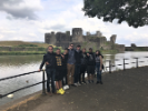 Students in front of Caerphilly Castle, a medieval fortification in Caerphilly in South Wales. The visit was part of UB’s School of Engineering and Applied Sciences - Swansea Study Abroad program.