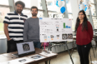 Adityan Harikrishnan, Akshay Verma and Roshni Murali display their computer vision project to extract data from tire images.