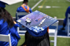 Many students displayed personalized graduation caps.