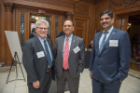 UB President Tripathi with two others at the Butler Mansion. 
