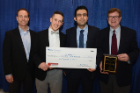 Taking second place was Shay Bioproducts. Accepting the award, were, from left, Blaine Pfeifer, associate professor of chemical and biological engineering, and doctoral students Charles Jones, Mahmoud Kamal Ahmadi. Robert Kosobucki, far right, from Insyte Consulting coached the team. Photo: Nancy J. Parisi