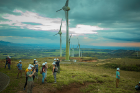 Students tour the turbines at the Celsia wind farm in Guanacaste.