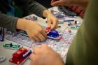 Snap Circuits uses color-coded pieces so kids can experiment with lights, fans, sound and other circuits found in everyday electronics.