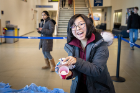 Lisa Hu, a senior mechanical and aerospace engineering major, shows off her egg after a successful drop.