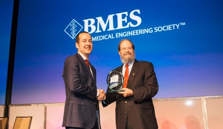 Jonathan Lovell receiving the Young Investigator Award at BMES. 
