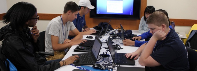 Students working on coding at UB North Campus. 