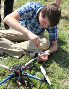 Student working on a drone. 