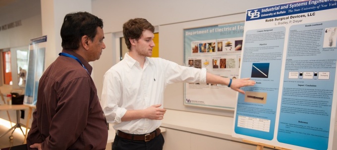 Robb Surgical Devices LLC. LBradley, P. Dreyer presenting their research at the 2014 design expo. 