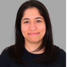 Portrait of Maysoon Alkhuzai in dark shirt. 