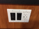 Capen 240 tech. Crestron switching interface, electrical outlets, USB ports. 