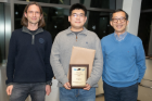 2018 CSE Graduate Research Award winner Di Wang is flanked by CSE Graduate Director Dimitrios Koutsonikolas and CSE Department Chair Chunming Qiao. Photo credit: Ken Smith