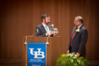 Jordan Walbesser presents Ashish Shah with the Engineer of the Year award.