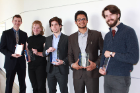 Seamus Lombardo, Mara Boardman, Alberto Padovan, Akshay Sivadas, and Walker Gosrich pose for a group photo with their awards.