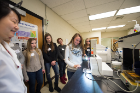 Prospective female students explore a biomedical engineering laboratory.