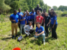 Students planted new trees at the Tifft Nature Preserve as a community service event.