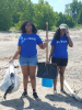 Anishka Mendez (L) (PHY ’21) and Angelys Cuello (BME ’19) picking up debris during the “Adopt-a-Beach” clean up of Woodlawn Beach. 