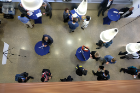 View from above: Students and industry partners in Bansal Atrium during the Career Preparation Reception.