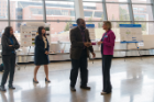 Dean Liesl Folks announces Ogechi Ogoke as the first place winner in the SEAS Graduate Student Poster Competition.