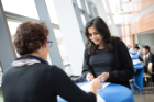 Judy Feldman, CIO/EVP at ValueCentric, gives feedback to a student on her resume/CV.