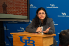 Aparajita Dasgupta speaking at poster session. 