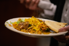 A plate filled with traditional South Asian cuisine.
