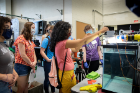 The experiment, flow visualization of different fins in water tanks, provided students with the opportunity to observe and document the results. Photo: Meredith Forrest Kulwicki