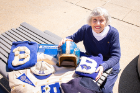 Concetta (or Connie) Rao, Mary’s grandmother and a UB alumna, displays just a portion of the family collection of UB memorabilia. Photo: Meredith Forrest Kulwicki