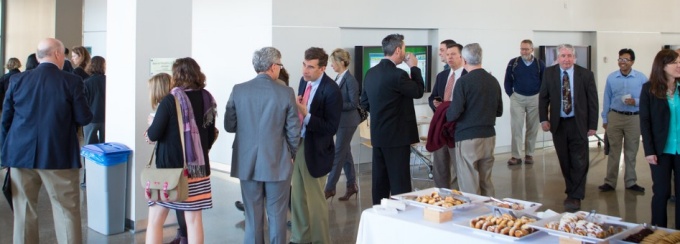 People at an event in Davis Hall atrium. 