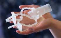 A group of faculty pose as a group. 