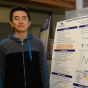 Li Sun presents his poster, "Bringing Mobility-Awareness in WLANs using PHY Layer Information", at the CSE Grad Student Poster Session. Photo credit: Ken Smith. 