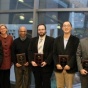 Engineering Awards Ceremony. Pictured are: Luke Ziarek, Varun Chandola, Murat Demirbas, Kris Schindler, Edward Furlani, Dean Liesl Folks, Bharat Jayaraman, unknown, unknown, Kemper Lewis, unknown, Wenyao Xu. 