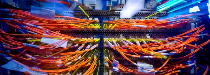 Zoom image: Patch cables in the Center for Computational Research Machine Room in the NYS Center of Excellence in Bioinformatics and Life Sciences, 2012. Photo credit: Douglas Levere 