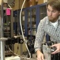 Computational physics student works in a lab. 