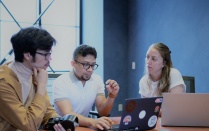 interns discussing problem.