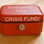Red Crisis Funding lock box with key. 