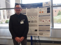 Zoom image: Kyle Mentkowski presenting at the competition