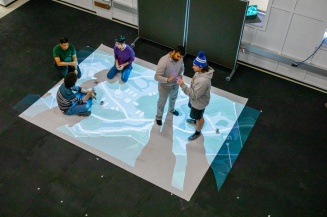 Students doing research in UB's drone research lab.