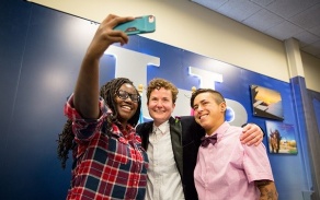 Friends celebrate graduation at the IDC Lavender reception. 