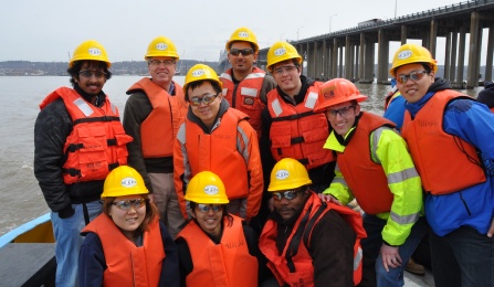 UB students wearing hard hats, touring the Tappan Zee Bridge. 