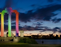 Baird Point lit up with the colors of the rainbow. 