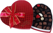 Heart-shaped box with chocolates. 