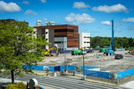 A building construction site for the future home of Russell L. Agrusa Hall on North Campus in late May 2026. 