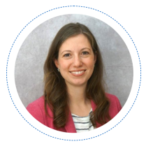 Profile picture of Caitlin Hoekstra, a brunette white female wearing a hot pink blazer and striped white shirt. 