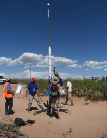 UB SEDS club students launching a rocket in the desert. 