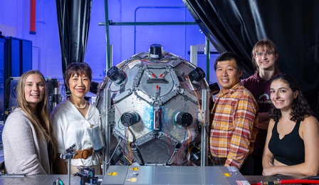 Researchers Hui Meng and James Chen, both with the Department of Mechanical and Aerospace Engineering, photographed in a research lab in Jarvis Hall in September. They are photographed with a turbulence chamber which they used to study why tiny particles form clusters in turbulent air. 