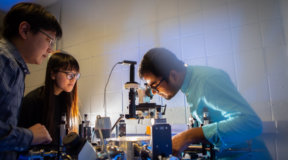 Students and faculty in materials lab.
